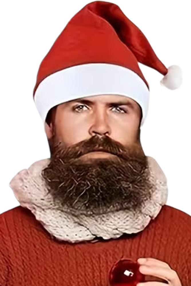 Άνδρας που φοράει κόκκινο χριστουγεννιάτικο σκούφο με λευκό γείσο και κόκκινο πουλόβερ